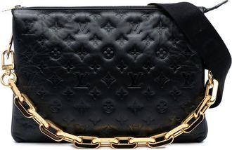 Louis Vuitton Borsa a tracolla Coussin MM Puffy in pelle di agnello con monogramma goffrato 2021-2025 - Nero
