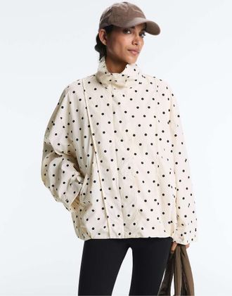 Oysho Giacca lunga idrorepellente a pois color &eacute;cru pallido-Neutro