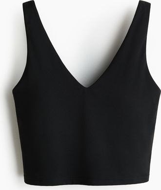 H&M Cropped Sporttop mit SoftMove - Schwarz