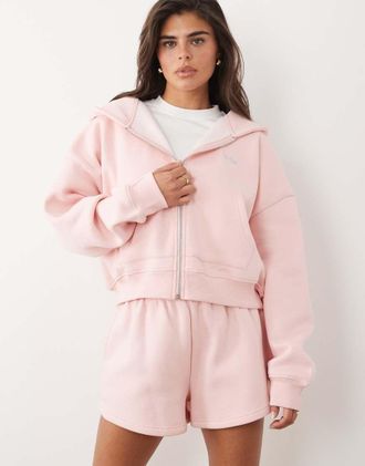 KAIIA Felpa con cappuccio oversize in misto cotone rosa con zip e logo in metallo argentato in coordinato