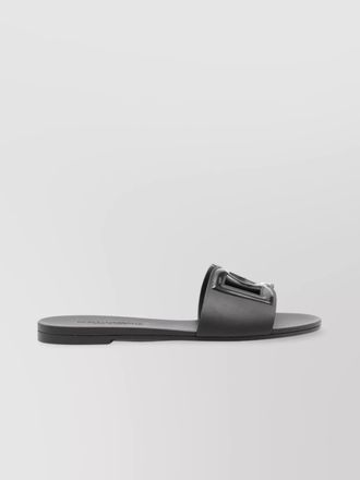 Dolce & Gabbana logo sliders featuring cut-out detailing