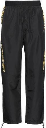 Versace PARTES DE ABAJO - Pantalones en YOOX.COM