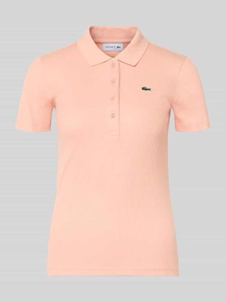 Lacoste Sport Slim Fit Poloshirt aus reiner Baumwolle in Apricot, Gr&ouml;&szlig;e 34