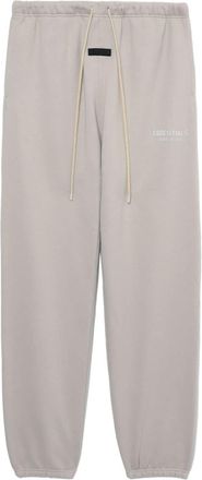 Fear of God logo-print jersey track pants - men - Polyester/Cotton - M - Grey