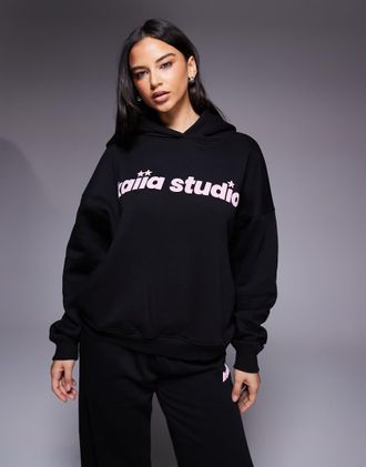 KAIIA Studio - Felpa con cappuccio oversize nero e rosa con logo e stelline in coordinato