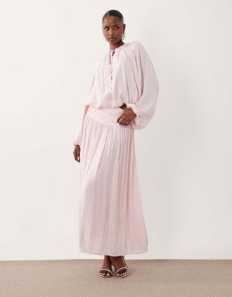 Gina Tricot Gina Tricot - Gonna lunga a pieghe rosa chiaro con vita scesa