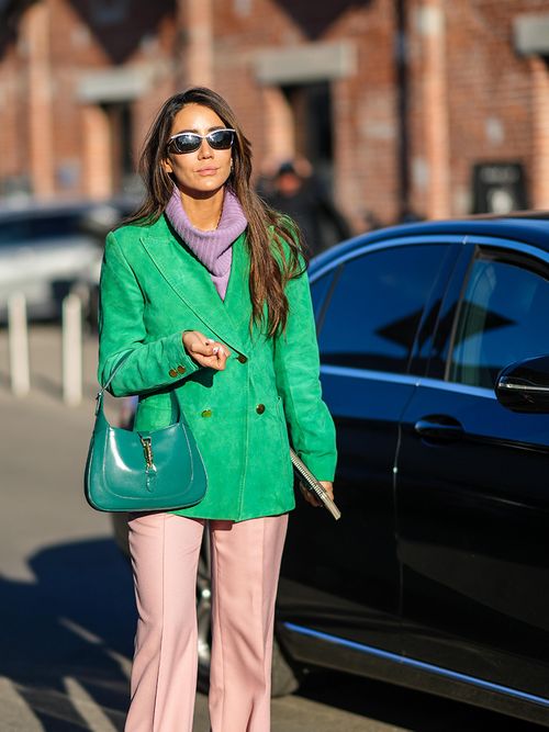 Green blazer worn with pink pants and green YSL bag