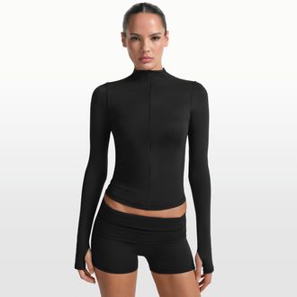 Nike Womens SKIMS Matte 1/2-Zip Mock-Neck Long-Sleeve Top in Black | TPZUP6797W-OBD