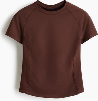 H&M Nahtloses Sport-T-Shirt mit DryMove in Slim Fit - Beige