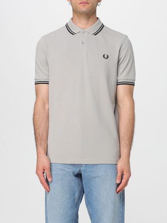 Comme Des Garçons Polo Comme Des Garçons in cotone con slogan