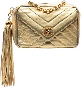 Chanel Borsa a tracolla in pelle di agnello metallizzata con nappa e motivo chevron 1991-1994 - Oro