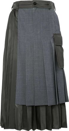 sacai Layered Pleated Skirt with Tailored Design and Flap Pockets