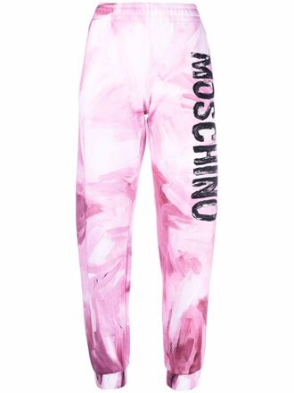 Moschino abstract-print branded track trousers - women - Cotton - 38 - Pink