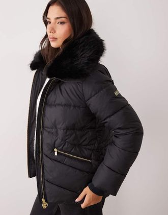 Barbour Cyrus piumino in pelliccia sintetica nero