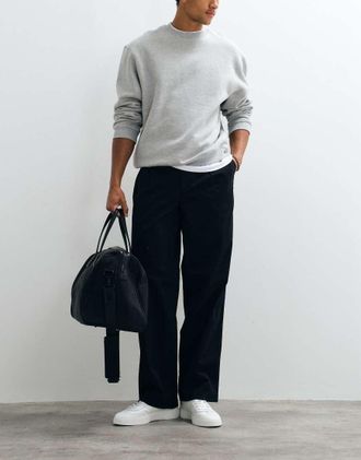 Calvin Klein Jeans Pantaloni in cotone verde oliva con piega sul davanti-Nero