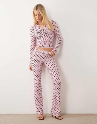 I.AM.GIA Blare - Pantaloni sportivi neri e rosa a pois con cuciture e logo a contrasto in coordinato