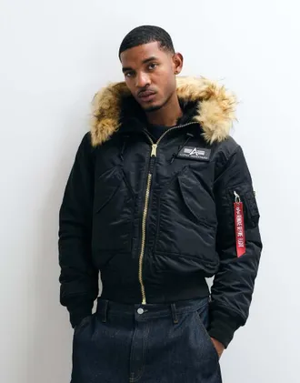 Alpha Industries giacca bomber con cappuccio in pelliccia sintetica nera-Nero