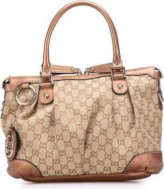 Gucci Pre-owned Handbags, female, Brown, Size: ONE SIZE Pre-owned Signature Pattern Top Handle Bag