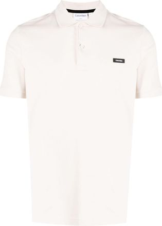 Calvin Klein logo-patch piqu&eacute; polo shirt - men - Elastane/Cotton - S - Neutrals