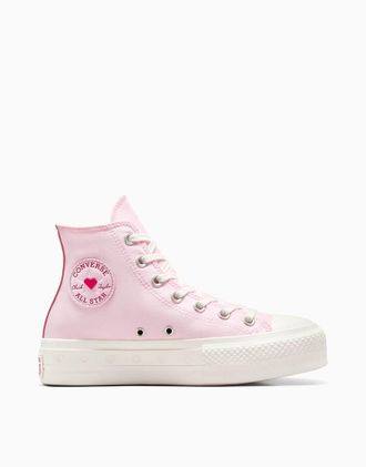 Converse Chuck Taylor All Star Lift sneakers in pink with red lace detail