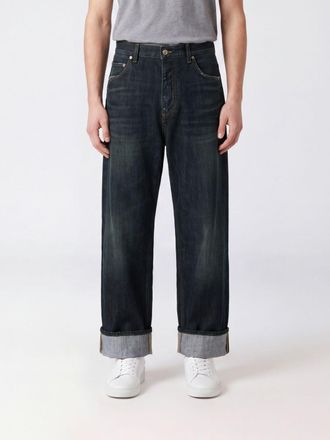 Dolce & Gabbana Jeans a gamba larga in denim di cotone con risvolto e logo