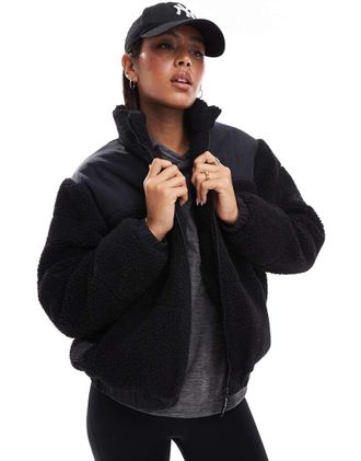 South Beach Giacca imbottita in pile borg nero con zip