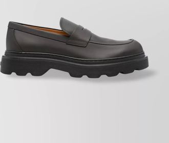 Tod's chunky sole penny strap round toe loafers