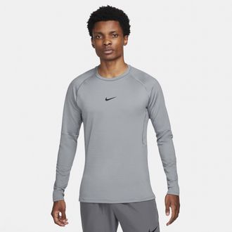 Nike Mens Nike Pro Warm Long-Sleeve Top in Grey | FB7982-084