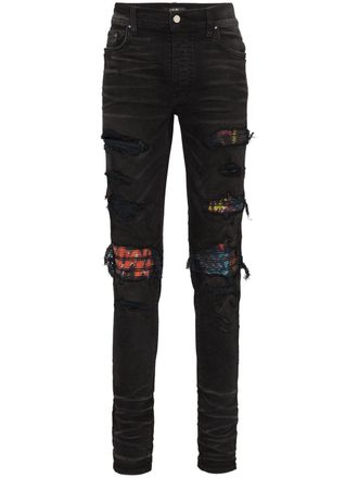 Amiri MX1 patch distressed slim-leg jeans - Black