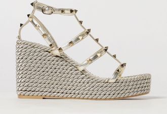Valentino Garavani Sandali con zeppa Rockstud in pelle laminata con borchie