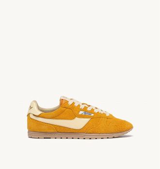 Autry Womens Windspin In Suede Sneaker In Mineral Yellow