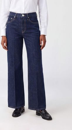 Khaite Jeans Clara flared a vita alta in denim di cotone