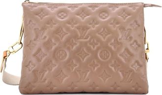 Louis Vuitton Coussin Bag Monogram Embossed Lambskin PM crossbody bag - Toni neutri