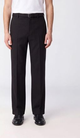Dries Van Noten Pantaloni sartoriali in lana con gamba larga e pince