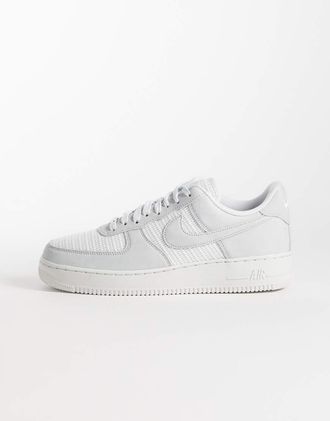 Nike Air Force 1 07 LV8 - Sneakers bianche e grigie-Bianco