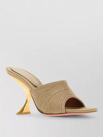Amina Muaddi taylor mules curved heel peep toe textured