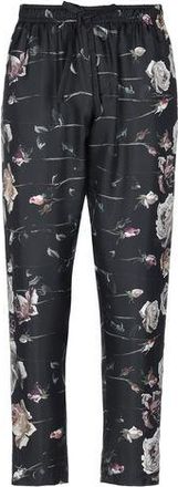 Dolce & Gabbana PARTES DE ABAJO - Pantalones en YOOX.COM