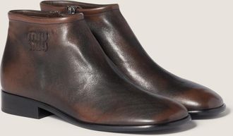 Miu Miu Fum&eacute; leather booties
