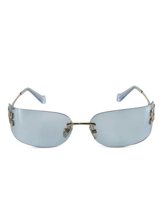 Miu Miu Eyewear logo-plaque rimless sunglasses - women - Metal - One Size - Blue