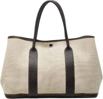 Herm&egrave;s Pre-owned Tote Bags, female, Brown, Size: ONE SIZE Pre-owned Garden Party PM Toile H Leather Canvas Tote Bag
