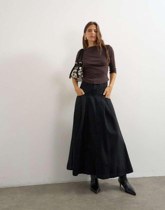 Topshop gonna lunga plissettata con carr&eacute; in nero slavato