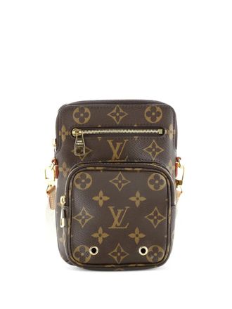 Louis Vuitton Utility Phone Sleeve Bag Monogram Canvas crossbody bag - Bruin