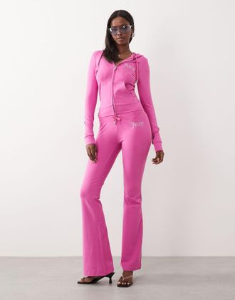 Juicy Couture Joggers a zampa a vita bassa rosa vivo con logo in strass in coordinato