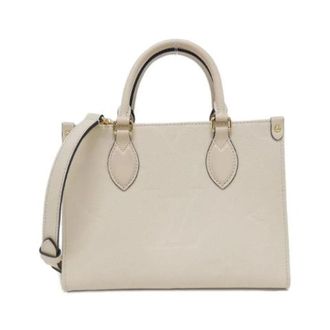 Louis Vuitton Pre-owned Onthego Monogram Empreinte Tas - Dames - Pre-owned - Beige - Maat: ONE Size Leer