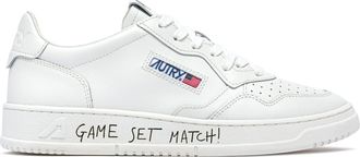 Autry Low-Top Leather Sneakers with Perforated Detailing and Unique Sole Accents