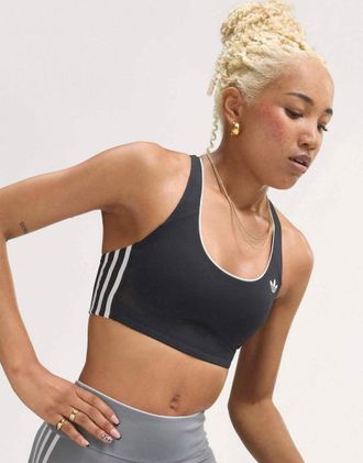 adidas adidas Originals reggiseno sportivo con supporto medio nero