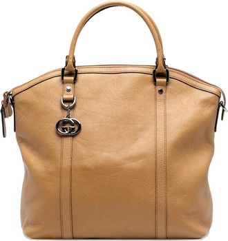 Gucci 2016-2025 grote GG Dome leren tas met bedel - Bruin