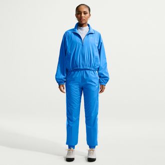 Nike Womens Nike Sportswear Classic Wovens UV Protection Mid-Rise Loose Jogger Pants in Blue | FV7660-435