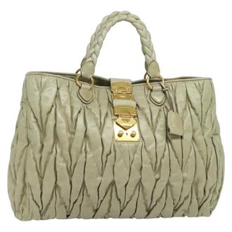 Miu Miu Coffer Convertible Satchel Leather Beige Leather Handbag (Pre-Owned)