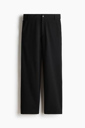 H&M Chinos mit Vierwegestretch in Loose Fit - Schwarz
